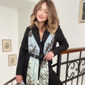 woman wearing Louis Jane Leaves long cashmere and silk scarf, belted, in cobalt blue and seafoam pale green colour