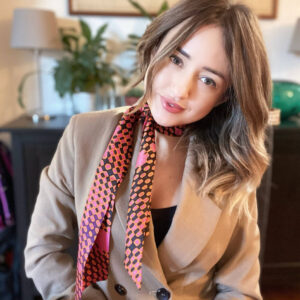 woman wearing vivaia twilly silk scarf hot pink and orange colour
