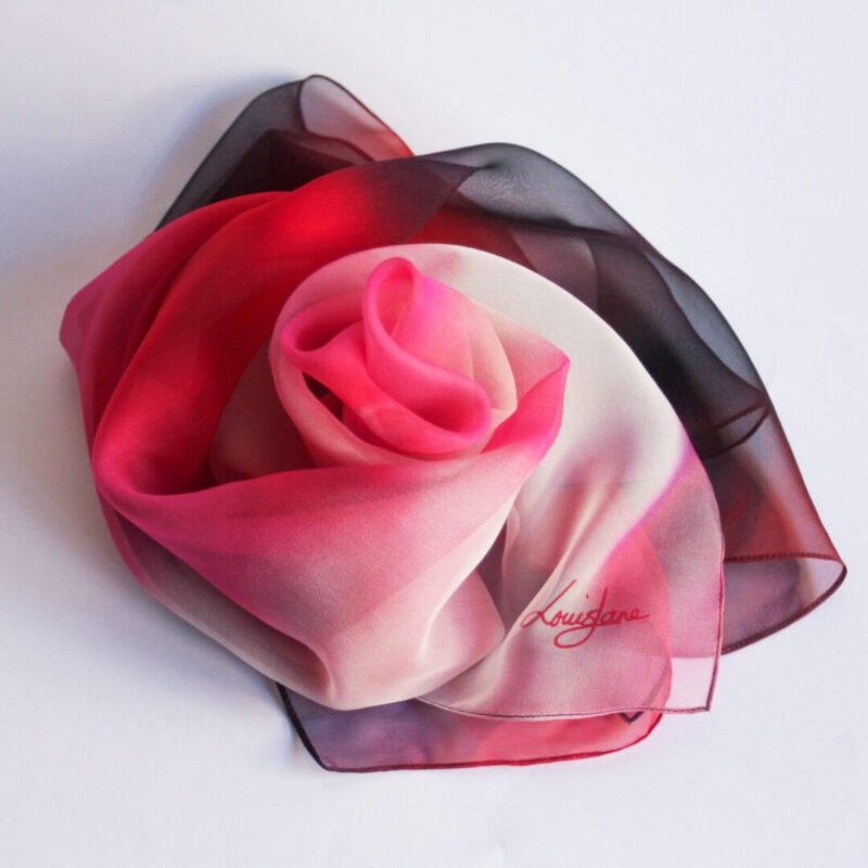 from deep dark red to pale white pink this delicate silk square is made from silk chiffon